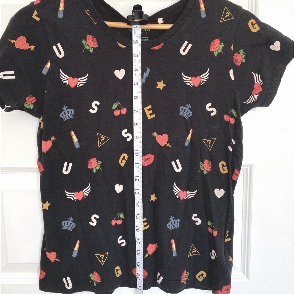 Guess women’s cropped tee shirt.